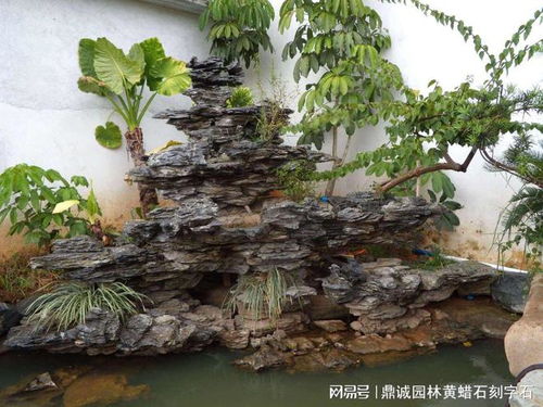 英石疊石假山流水水池案例,千層石流水假山效果設計